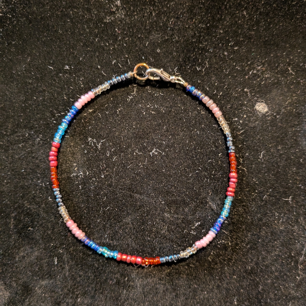 Red and Pink Beaded Bracelet with Gold Clasp